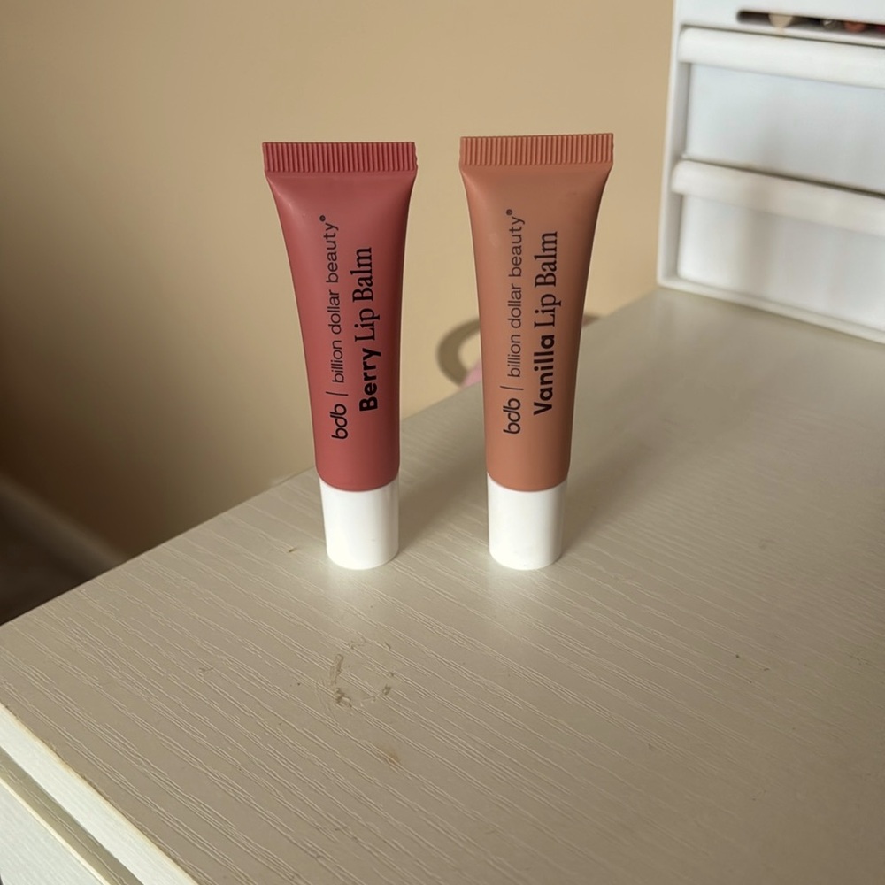 Two lip balms, berry and vanilla!